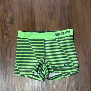 Green with grey strips Nike Pros